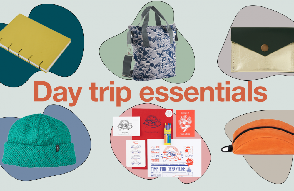 a collection of products selected for day trips, the image features a yellow notebook, a blue tote bag, a green and gold purse, a teal beanie, a children's activity pack, an orange bum bag