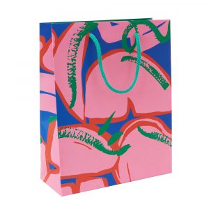 Large gift bag featuring a pink and blue print with highlights of red and greed.