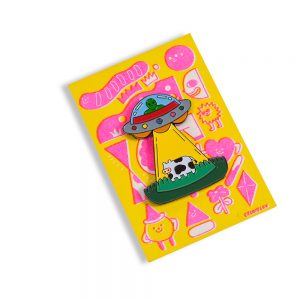Alien Enamel Pin on riso printed card backing