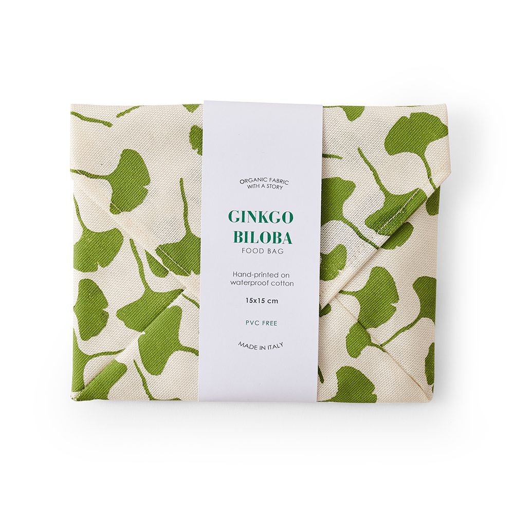 Cotton food wrap with green leaf design.