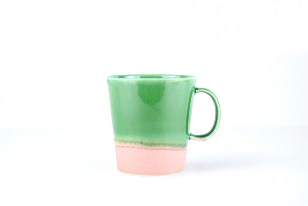 This cute tiny green and pink espresso cup makes a perfect present