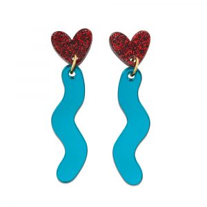 Drop earrings featuring a heart with a squiggly shape hanging down from them. In red glitter and teal mirrored acrylic