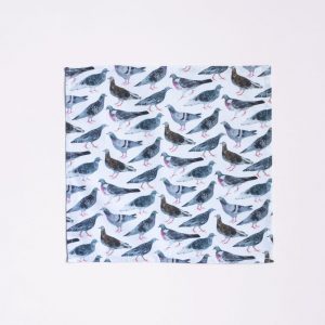 A square cotton handkerchief featuring a repeat print of different breeds of pigeons.