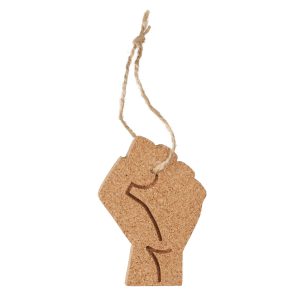 A cork ornament with a raised fist design and twine loop.