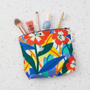 A make up bag with a tropical hibiscus flower print.