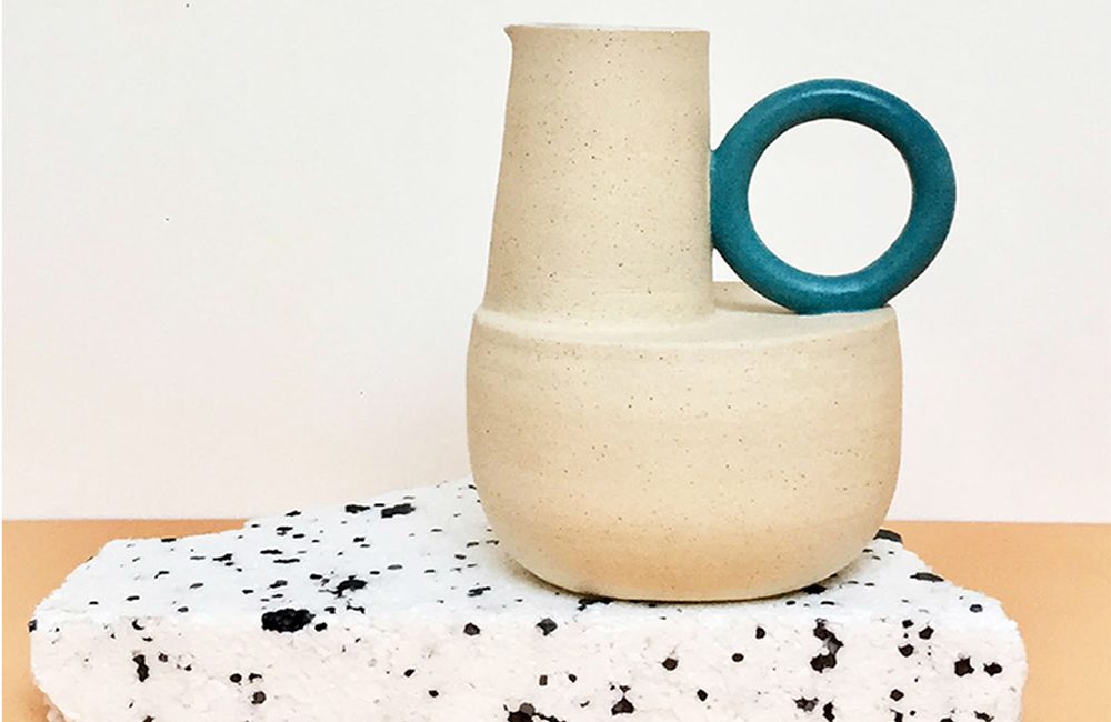 Unusual homeware big ceramic jug with turquoise handle