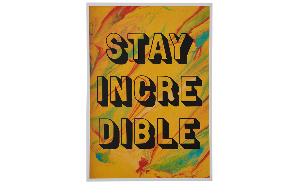 'Stay Incredible' on top of a yellow marbled background
